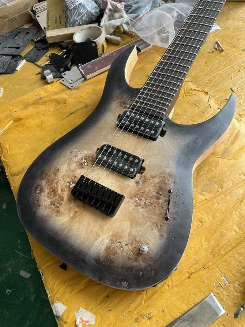Guitarra eléctrica de 7 cuerdas de alta calidad, mástil de 5 piezas de madera de ala de pollo y caoba, cuerpo de madera de ceniza, puente fijo negro, entrega gratuita